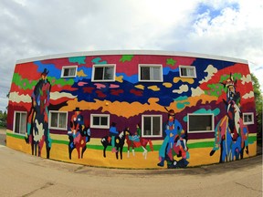 Jean Paul Langlois' brand-new mural The Conversation at 6551 111 St. in Parkallen.