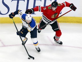 Jaden Schwartz of the St. Louis Blues skates against Connor Murphy of the Chicago Blackhawks during the second period in an exhibition game prior to the 2020 NHL Stanley Cup Playoffs at Rogers Place on July 29, 2020.
