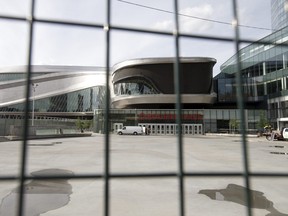 Fencing has been put up in the Edmonton Ice district outside the south entrance to Rogers Place, in Edmonton Monday July 20, 2020. Fencing has been set in the area as part of the NHL Hub City 'hockey bubble'. Photo by David Bloom