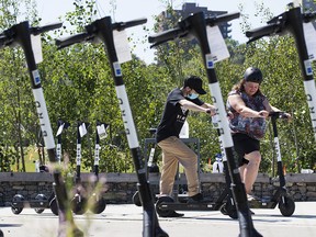 Bird Canada e-scooters are pictured in Edmonton. The company announced it is expanding e-scooter operations in the city and launching a loyalty program to mark one year in Edmonton.