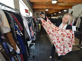 Mavis Bergquist in her Edmonton consignment shop called Good Stuff. She re-opened in May as retailers take tentative steps back into their business.