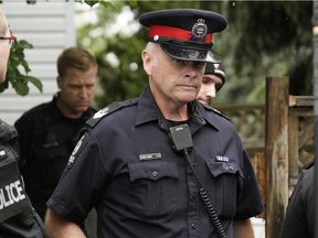 Accused kidnapper and child molester Wade Stene is escorted by police from his home after his bail was revoked on Tuesday June 30, 2020.