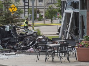 An Audi crashed into a Starbucks cafe on Calgary Trail near 53 Ave. killing three occupants on July 3, 2020. Photo by Shaughn Butts / Postmedia