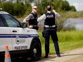 A police road block near the scene of a plane crash on RR232 east of Leduc on Friday July 3, 2020.