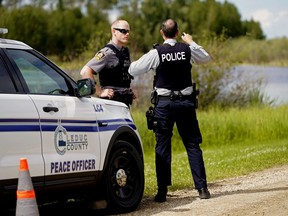 A police road block near the scene of a plane crash east of Leduc, July 3, 2020.