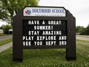 Back to school sign at Holyrood School on Tuesday, July 21, 2020 in Edmonton.