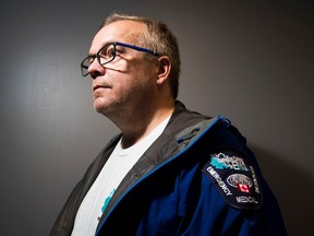 Greg Clarke poses for a portrait on Saturday, July 25, 2020 in Edmonton. Clark is a former EMS for 30 years, now teacher and clinic paramedic. He has published a book about how to respond to an opioid overdose.