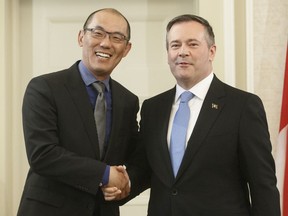 Premier Jason Kenney, right, and associate minister of mental health and addictions Jason Luan. File image.