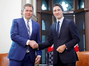 Canada's Prime Minister Justin Trudeau meets with Conservative Party leader and Leader of the Official Opposition Andrew Scheer on Parliament Hill in Ottawa, Ontario Canada November 12, 2019.