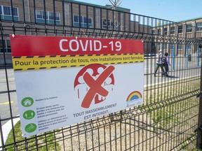 An elementary school in Montreal North is seen, Thursday, May 14, 2020 in Montreal. A new poll suggests more than half of parents plan to send their kids to school if and when they reopen, but that a significant number remain on the fence amid concerns about COVID-19.THE CANADIAN PRESS/Ryan Remiorz