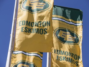 Edmonton Eskimos flags fly outside Commonwealth Stadium. File photo.