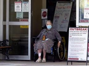 A woman exits the front door of the Good Samaritan Society Southgate Care Centre, 4225 107 St., July 29, 2020. Several deaths have now been linked to a COVID-19 outbreak at the care home.