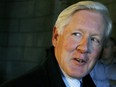 Bob Rae looks back at the media as he leaves the Liberal caucus meeting on Parliament Hill in Ottawa on Thursday Oct. 23, 2008. Rae is being named Canada's new ambassador to the United Nations.