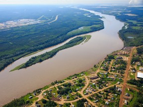 An aerial view of Fort McKay, Alta. with the Syncrude oilsands operation in the background. File photo.