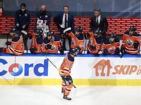 EDMONTON, ALBERTA - AUGUST 03: Connor McDavid #97 of the Edmonton Oilers celebrates with his teammates after scoring a goal against Corey Crawford #50 of the Chicago Blackhawks during the first period in Game Two of the Western Conference Qualification Round prior to the 2020 NHL Stanley Cup Playoffs at Rogers Place on August 03, 2020 in Edmonton, Alberta.