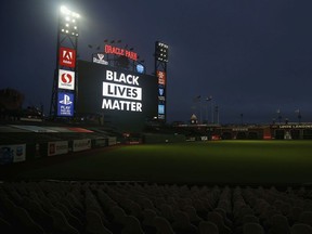 The words 'Black Lives Matter' are displayed on the digital screen after the postponement of the game between the San Francisco Giants and the Los Angeles Dodgers at Oracle Park on Wednesday in San Francisco, California. Several sporting leagues across the nation today are postponing their schedules as players protest the shooting of Jacob Blake by Kenosha, Wisconsin police.