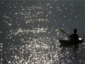 A lone kayaker 
on Pigeon Lake on July 11, 2019.