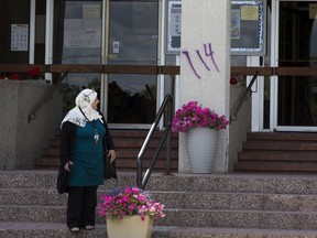Edmonton police are investigating racist spray paint graffiti found on the Al Rashid Mosque as a hate crime on Tuesday, July 14, 2020 in Edmonton.  Pillars on the mosque's front steps were vandalized in purple spray paint.