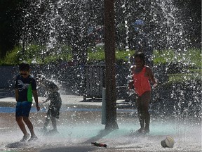 With the temperature around 30 C, spray parks were the choice way to cool down at the Kinsmen Spray Park in Edmonton, August 5, 2020.