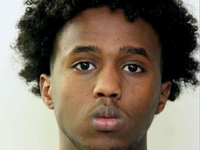 Police are searching for Salah Ali Aden, charged in connection to a Leduc shooting in July.