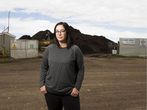 Sarah Hunter in front of the Cleanit Greenit composting site on Saturday, Aug. 29, 2020 in Edmonton.  Hunter and many other west end residents are fed up with the stench coming from the composting site.