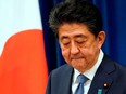 Japanese Prime Minister Shinzo Abe gestures during his press conference at the prime minister official residence in Tokyo