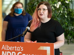 Teacher Kendra Mills speaks during a news conference by NDP Opposition eduction critic Sarah Hoffman at the Federal Building, on Aug. 17, 2020.