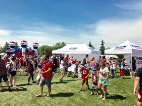 RE/MAX Elite agents make a difference in the community through volunteering, giving back and leadership, including hosting previous Canada Day celebrations in Broadmoor Park, as seen here in 2018.