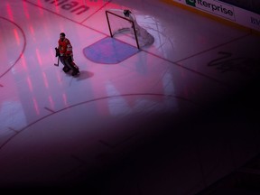 Chicago Blackhawks goaltender Corey Crawford (50) stands prior to taking on the Edmonton Oilers in NHL Stanley Cup qualifying round action in Edmonton, Wednesday, Aug. 5, 2020.