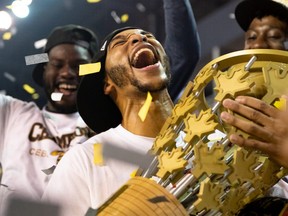 Edmonton Stingers guard Xavier Moon holds the Canadian Elite Basketball League championship trophy after leading his team to a 90-73 win against the Fraser Valley Bandits in the CEBL Summer Series championship game at the Meridian Centre in St. Catharines, Ont., on Sunday, Aug. 9, 2020.