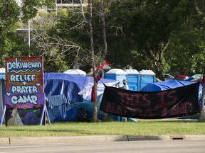 Camp Pekiwewin, a river-valley camp-out organized to help advocate for the city's homeless population, has been set up in a parking lot west of Remax Field, in Edmonton Tuesday Aug. 11, 2020.