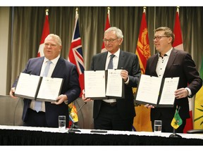 Ontario Premier Doug Ford (L), Premier Blaine Higgs of New Brunswick and Saskatchewan Premier Scott Moe announce a collaboration between the provinces on small, modular nuclear reactors on Sunday December 1, 2019.