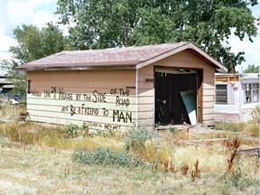 A garage outside Saco, Montana, with Oliver Homes poetry is in Kyler Zeleny's new photo book.