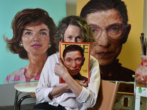 Shana Wilson with her portrait of Ruth Bader Ginsburg, which adorned Time Magazine.