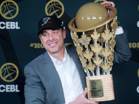 Mike Morreale, commissioner and CEO of the Canadian Elite Basketball League, holds up the CEBL championship trophy after announcing the new Ottawa BlackJacks expansion in this file photo from Nov. 20, 2019.