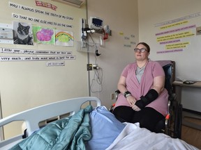 Misha Campbell, seen at the Royal Alexandra Hospital in August, says when police officers responded to her suicide call last August she was kicked repeatedly by an officer. In December, she jumped from a fourth-storey railing in a downtown Edmonton shopping centre and will have to use a wheelchair for the rest of her life.