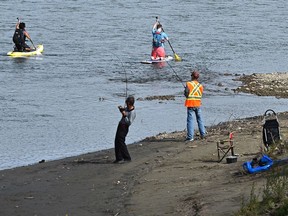 The North Saskatchewan River was busy Friday with boaters and people fishing along the shoreline in Edmonton, September 11, 2020.