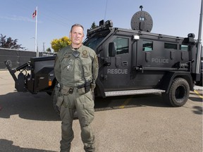 Sgt. Rick Abbott in front of  the new armoured rescue vehicle, ARV2, on Wednesday, Sept. 16, 2020 in Edmonton.