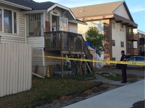 Edmonton police investigate the scene of a shooting near 107 Street and 106 Avenue on the evening of Sept. 26, 2020. A man in his early 20s was taken to hospital with non-life threatening injuries.