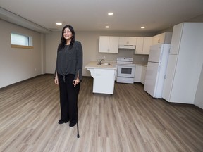 Patricia Thomas stands in her new home in the new supportive housing facility in Belvedere where the builders, Niginan, hope to change the way at-risk families are supported