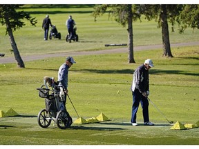 Golfers take advantage of the last days of summer at the Derrick Golf Club in Edmonton on September 29, 2020. More people have been golfing and boating during the COVID-19 pandemic.