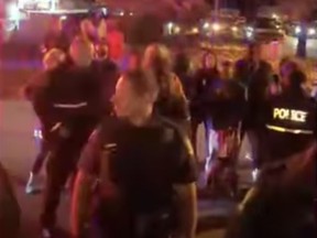 At about 8 p.m., Edmonton police attended a "demonstration involving opposing groups" in a parking lot near 118 Avenue and 82 Street September 29, 2020 there were about 100 people in attendance. Screengrab/YouTube