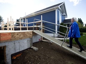 Métis Nation of Alberta President Audrey Poitras tours a Métis Capital Housing Corporation affordable housing project at 13027 133 St., in Edmonton Wednesday Sept. 2, 2020. Photo by David Bloom