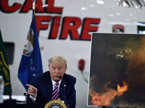 US President Donald Trump speaks during a briefing on wildfires with local and federal fire and emergency officials at Sacramento McClellan Airport in McClellan Park, California on September 14, 2020.