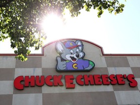 A sign is posted on the exterior of a Chuck E. Cheese's restaurant on June 25, 2020 in Pinole, California. CEC Entertainment, the parent company of Chuck E. Cheeses restaurants, has filed for Chapter 11 bankruptcy protection after suffering a huge financial hit due to coronavirus COVID-19 pandemic closures.