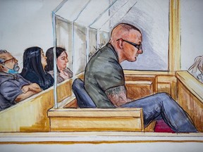 In this courtroom sketch, reputed gang leader Jamie Bacon is seen sitting in a courtroom at B.C. Supreme Court during a sentencing hearing, in Vancouver, B.C., Friday, Aug. 28, 2020.