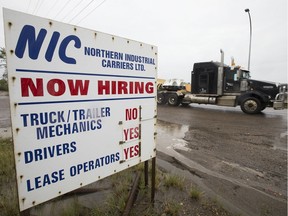 A hiring sign outside Northern Industrial Carrier Ltd., 7823 34 St., in Edmonton Aug. 7, 2020.
