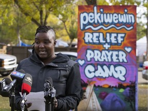 Camp Pekiwewin media liaison Shima Robinson speaks to the media about the demands and achievements of the homeless camp set up in a parking lot west of Remax Field, in Edmonton Wednesday Sept. 23, 2020. Photo by David Bloom