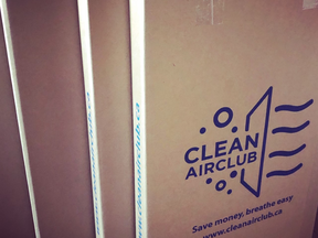 Cardboard boxes stamped with clean air club logo