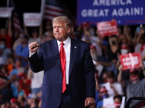 U.S. President Donald Trump concludes a campaign rally at Smith Reynolds Regional Airport in Winston-Salem, North Carolina, U.S., Sept. 8, 2020.